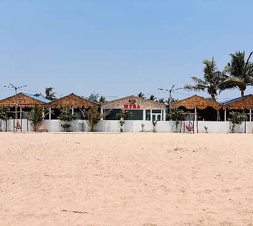 Thatched huts on the beach